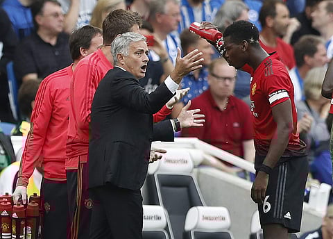 Manchester United's manager Jose Mourinho gestures as he speaks to Paul Pogba during the English Premier League. (File Photo| AP)