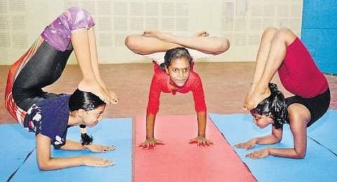 Three of the participants who will represent Kerala at the 8th edition of the Asian Yoga Sports Championship   Vincent Pulickal