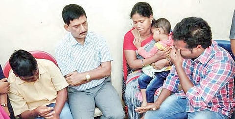 DGP RP Thakur consoling the family members of slain former MLA Siveri Soma at Araku in Visakhapatnam district on Wednesday | EXPRESS