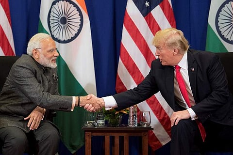 US President Donald Trump (R) shakes hands with Indian Prime Minister Narendra Modi during a bilateral meeting on the sideline of the 31st Association of Southeast Asian Nations (ASEAN) Summit in Manila on November 13, 2017. (Photo | AFP)