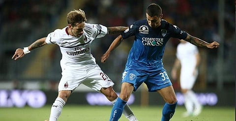 AC Milan's Lucas Biglia fights for the ball with Empoli's Rade Krunic during their Serie A clash (Photo | Twitter/AC Milan)