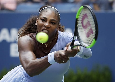 Serena Williams returns a shot to Kaia Kanepi, of Estonia, during the fourth round of the U.S. Open tennis tournament. (Photo | AP)
