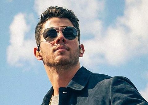 Nick Jonas reveals he has Influenza A, apologizes to fans for not being able to perform