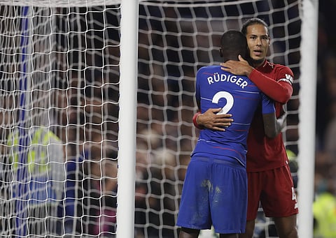 Chelsea's Antonio Ruediger hugs Liverpool's Virgil van Dijk after the English Premier League match at Stamford Bridge stadium in London | AP