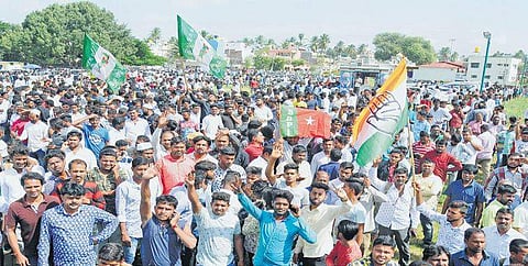 People celebrating outside a counting centre in Mysuru | Udayshankar S