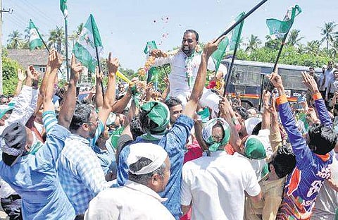 JD(S) workers celebrate the victory of one of its candidates in Ullal near Mangaluru on Monday. | Express Photo Services