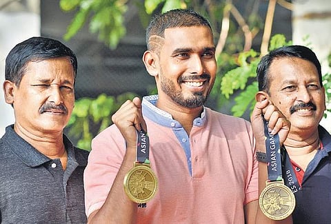 A Sharath Kamal, who won two bronze medals at the Asian Games, with his coaches A Srinivasa Rao (L) & A Muralidhara Rao in Chennai on Monday | d sampathkumar
