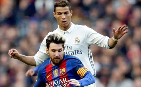 Former Real Madrid striker Cristiano Ronaldo (R) and Barcelona striker Lionel Messi (File | AP)
