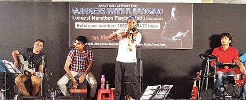 M S Viswanath with his team during the practice session