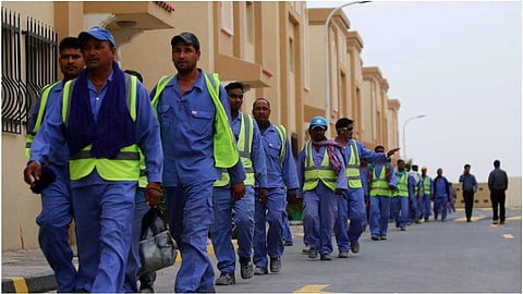 Foreign labourers in Doha working at the construction site of the Al Wakrah football stadium, one of the Qatar's 2022 World Cup stadiums. Qatar has abolished the kafala sponsorship system. | AFP