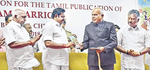Chief Minister Edappadi K Palaniswami receiving the first copy of the Tamil version of ‘Exam Warrior’, written by Prime Minister Narendra Modi from Governor Banwarilal Purohit at Raj Bhavan on Tuesday | Express