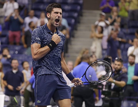 Novak Djokovic, of Serbia, celebrates after defeating John Millman, of Australia, 6-3, 6-4, 6-4 in the quarterfinals of the U.S. Open tennis tournament, Wednesday, Sept. 5, 2018, in New York. | AP