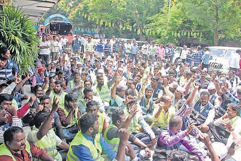 Workers protest demanding equal pay for equal work, in front of the  GHMC head office, on Wednesday in Hyderabad | Sathya keerthi