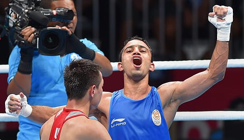 Amit Panghal became only the eighth Indian boxer ever to claim a gold medal at the Asian Games . (Photo  PTI)