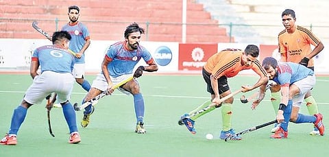 MHA & Indian Army players in action on Friday. Army won 5-1 | d sampathkumar