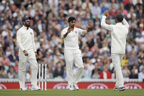 India's Jasprit Bumrah, center, celebrates taking the wicket of England's Adil Rashid during the fifth Test match of a five match series between England and India at the Oval cricket ground in London, Saturday, Sept. 8, 2018. | AP