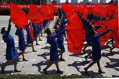 North Korea staged a huge military parade on Sunday to mark its 70th anniversary as a nation but held back its most advanced missiles and devoted nearly half of the parade to civilian efforts to build the domestic economy. | Associated Press