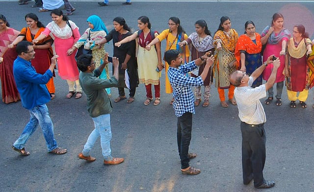 Those who took part in the Wall included elected representatives, students, housewives, officials, Kudumbashree workers, Anganwadi workers, helpers, Asha workers, and MNREGS workers.The women started assembling on the sides of the road at 3.45 PM itself.  LDF activists from Kottayam and Pathanamthitta districts joined the wall at various places in Alappuzha. Works Minister G Sudhakaran, Finance Minister T M Thomas Isaac, Food and Civil Supplies Minister P Thilothaman, Animal Husbandry Minister K Raju, MLAs Prathibha Hari, R Rajesh, Saji Cheriyan and A M Ariff and other representatives from local self-government institutions attended public meets organised at various places as part of the wall. The LDF had arranged meetings at 30 centres along the NH in the district. (Photo | Manu R Maveli/EPS)