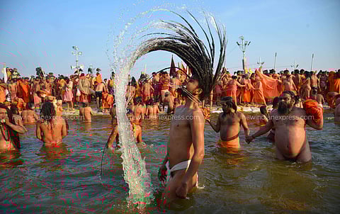 The much-awaited 50-day Kumbh Mela commenced on 15 January to a roaring start as auspicious Makarsankranti dawned upon the sangam, the confluence of holy Ganga, Yamuna and mythological Saraswati, and 1.25 crore devotees, including sadhus, seers, religious leaders and common public took a holy dip amid chants of 'Har Har Gange' during the first 'shahi snan' in Prayagraj (formerly Allahabad). A holy dip at Sangam is believed to lead the devotees towards the atonement of their sins and it frees a person from the cycle of death and birth. The Ardh Kumbh, which has been renamed as Kumbh this time, falls every six years. (Photo | Pushkar V / EPS)