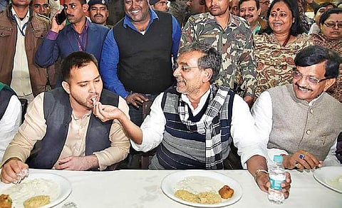 Bihar Congress state president Madan Mohan Jha with RLSP leader Upendra Kushwaha and RJD leader Tejashwi Yadav in Patna on Tuesdayy | pTI