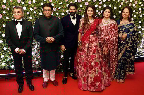 Raj Thackeray's son Amit Thackeray recently tied the knot with his childhood sweetheart and fashion designer Mitali Borude in Mumbai on January 27. IN PIC: Family Members along with newly wed Amit Thackeray and Mitali Borude pose for a picture during thei