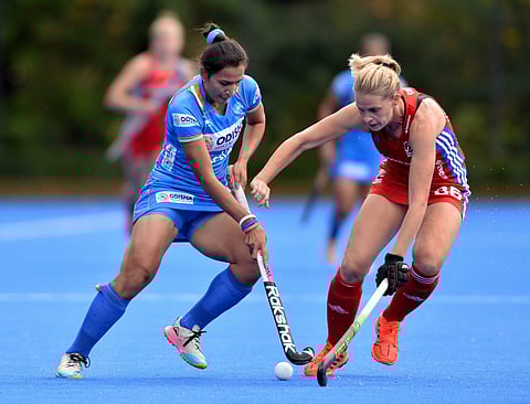 Players of Indian and British hockey teams vie for the ball during the third match of their Tour of England in Marlow. (Photo | PTI)