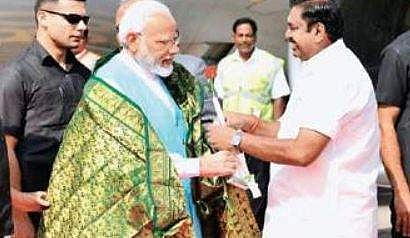 CM Edappadi K Palaniswami welcoming PM Modi at Chennai airport