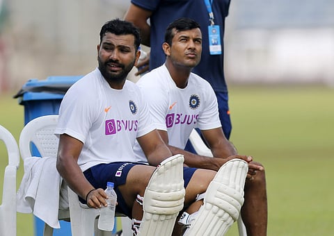 Indian cricketer Rohit Sharma, left, and Mayank Agarwal attend a practice session ahead of the second test match between India and South Africa in Pune (Photo| AP)