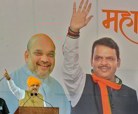 Home Minister Amit Shah addresses his supporters during a rally ahead of Maharashtra's assembly election at Jath in Sangli district of Maharashtra. ( Photo | PTI )