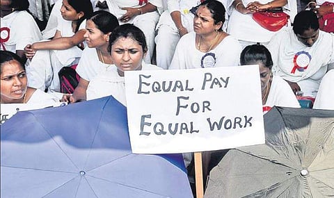 Nurses employed under various schemes of National Health Mission protest demanding wage revision and equal pay, at Cheapauk on Wednesday |  DEBADATTA MALLICK.