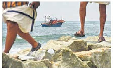 Rescue workers on boat trying to locate the students who went missing in the sea near Muthalapozhi beach in Thiruvananthapuram on Thursday | B P Deepu