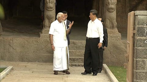 Prime Minister Narendra Modi with his Chinese President Xi Jinping in Mamallapuram on Friday. Express