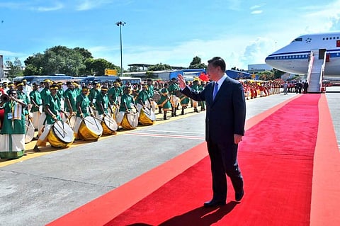 Chinese President Xi Jinping welcomed by traditional folk artists at the Chennai International airport. (Photo | Twitter / MEAIndia)