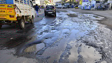 The GP road, off Anna Salai, is seen riddled with potholes Photo| Sampath Kumar