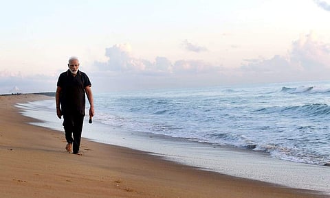 PM Narendra Modi at a Mamallapuram beach (Photo | Twitter)