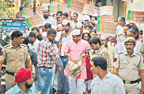 Delhi Pradesh president Manoj Tiwari leads the Gandhi Sankalp Yatra at Nehru Vihar under Timarpur constituency on Saturday. (Photo | BJP MEDIA CELL)