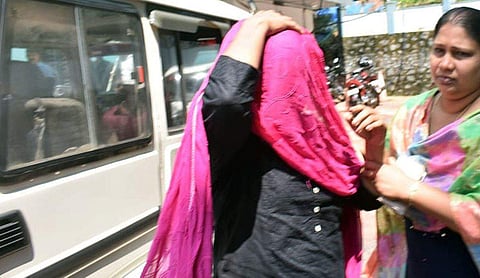 Jollyamma (face covered)