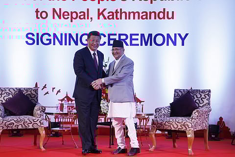 Chinese President Xi Jinping left and Nepalese Prime Minister Khadga Prasad Oli greet during their bilateral meeting in Kathmandu. (Photo| PTI)