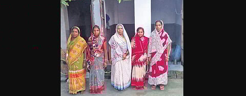Women using toilet at Mohamedabad village in Bihar after it was declared ODF