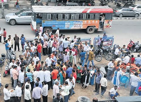 Family of striking RTC workers take part in vanta varpu programme at Ranigunj bus depot in Hyderabad on Sunday | S Senbagapandiyan