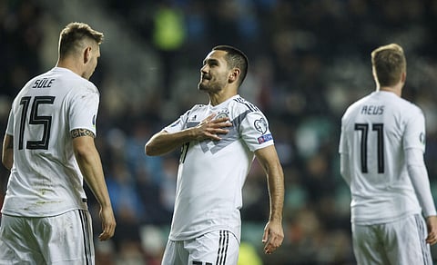 Germany's Ilkay Gundogan (C) celebrates after scoring his side's first goal against Estonia. (Photo | AP)