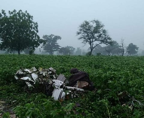 Mangled remains of the trainee aircraft that crashed into cotton fields at Sultanpur village in Vikarabad district of Telangana. | (File | EPS)