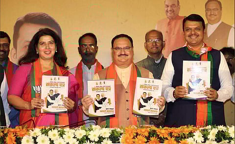 BJP releasing Sankalp Patra (Twitter Photo)