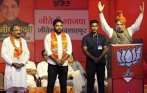 Union Home Minister Amit Shah addresses an election campaign rally in support of BJP candidates ahead of Haryana Assembly elections in Gurugram Wednesday Oct. 16 2019. | (Photo | PTI)