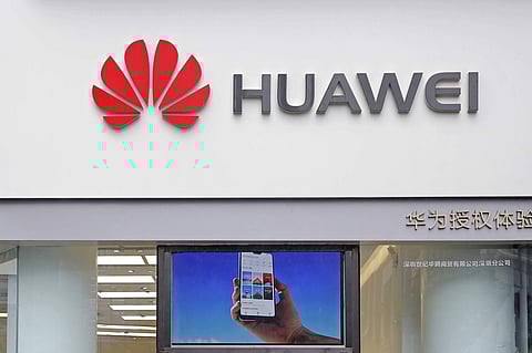 The logo of Huawei is displayed at a shop in China (File photo| AP)