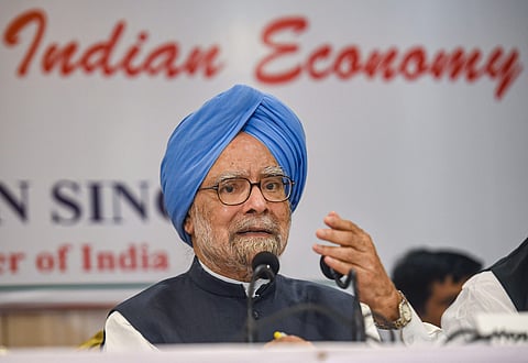 Congress senior leader and former prime minister Manmohan Singh addresses a press conference in Mumbai. (Photo | PTI)