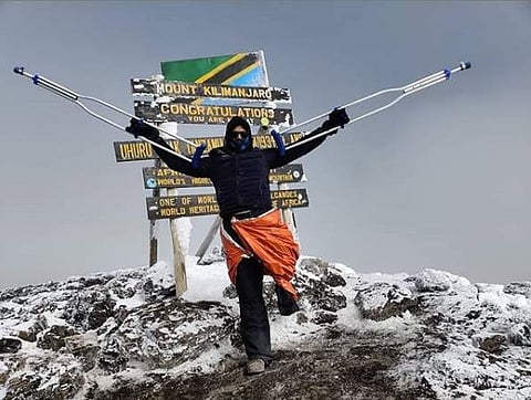 Neeraj George Baby on the summit of Mt Kilimanjaro, the highest peak in South Africa | Express