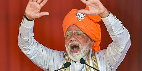 PM Narendra Modi gestures as he speaks during an election campaign rally ahead of Assembly polls in Hisar district of Haryana. (Photo | PTI)