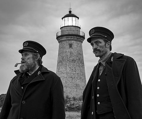 This image released by A24 Films shows Willem Dafoe, left, and Robert Pattinson in a scene from 'The Lighthouse.' (Photo | AP)
