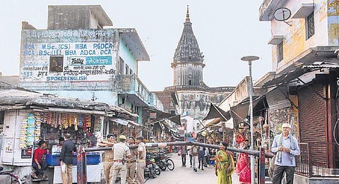 Policemen at the check point of Hanumangarhi Chauraha in Ayodhya on October 17. (Photo | PTI)
